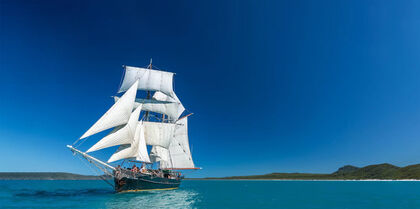 Historic ship on turquoise waters