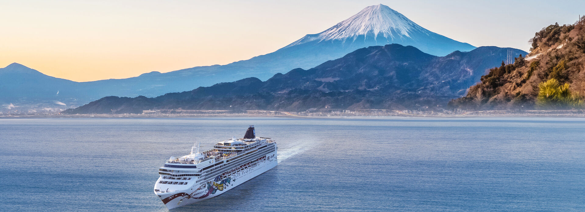 Cruise Asia with NCL banner
